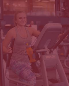 photo of woman using an elliptical machine - with red overlay
