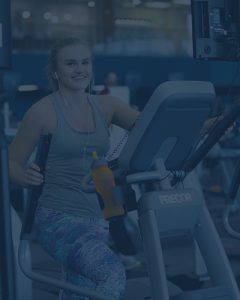 photo of woman using an elliptical machine - with blue overlay