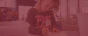 photo of young girl at the kids club - with red overlay