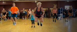 photo of an instructor teaching a fitness class