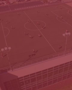 photo of soccer field on roof of the Princeton club - with red overlay