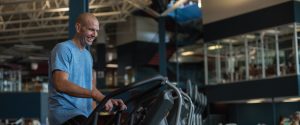 man using a fitness stair climber