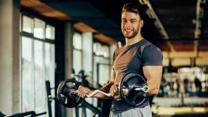 man lifting weights